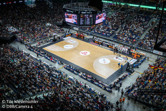 Total shot of basketball hall with audience